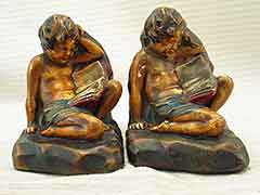 Product photo #100_6020 of SKU 21001238 (“Cherub Reading” Child 1910s Armor Bronze Antique Bookends)