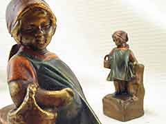Product photo #100_6157 of SKU 21001245 (“Basket Case” Little Girl 1920s Armor Bronze Antique Bookends)