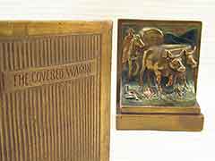 Product photo #100_7558 of SKU 21001307 (“The Covered Wagon” 1920s Pompeian Bronze Antique Bookends)
