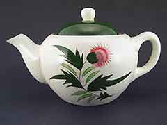 Product photo #100_8641 of SKU 21004008 (STANGL USA 1950s Thistle Teapot, plus Creamer & Coaster)