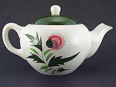 Product photo #100_8644 of SKU 21004008 (STANGL USA 1950s Thistle Teapot, plus Creamer & Coaster)