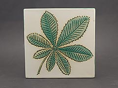 Product photo #100_9844 of SKU 21004038 (Pennsbury Pottery, Green and White “Dandelion Leaf” Tile)