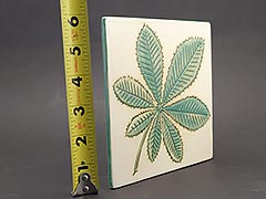 Product photo #100_9845 of SKU 21004038 (Pennsbury Pottery, Green and White “Dandelion Leaf” Tile)